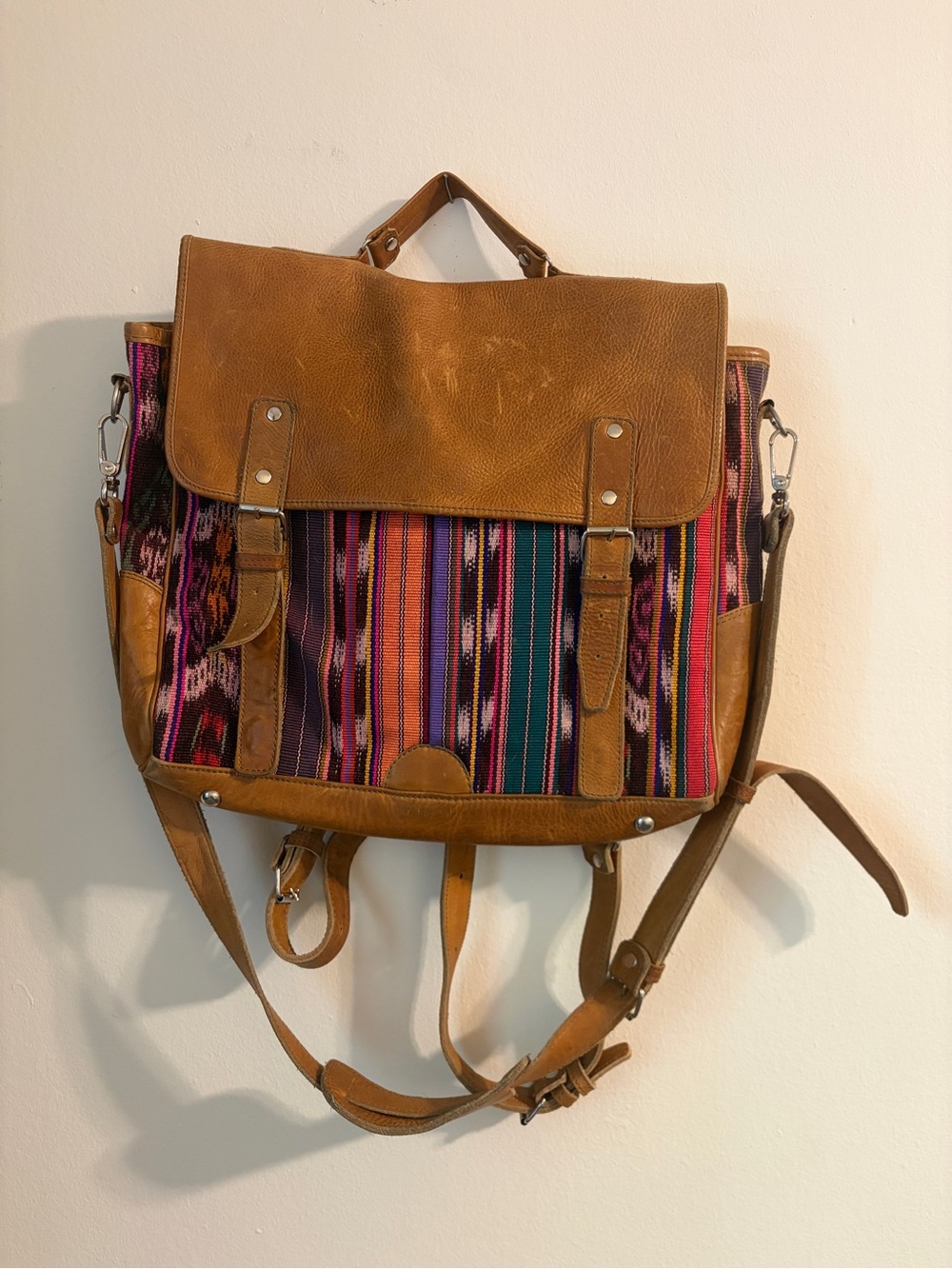 Nena & Co. Brown Leather Crossbody Backpack with Multicolor Striped Textile